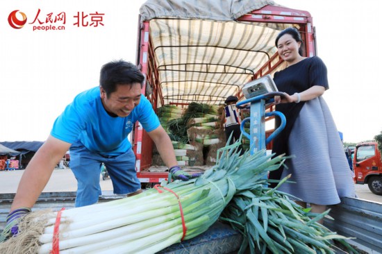 习近平看望慰问新发地市场_北京新发地农产品批发市场_新发地农产品批发市场地址